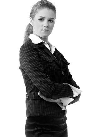 a young man wearing a suit and tie