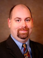 a man wearing a suit and tie