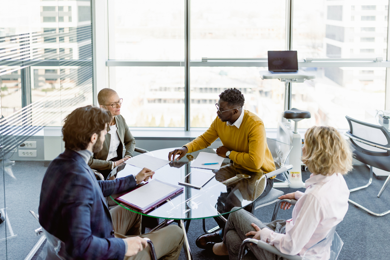 a group of people sitting at a table