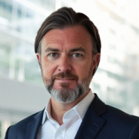 Lee Bennett a man wearing a suit and tie